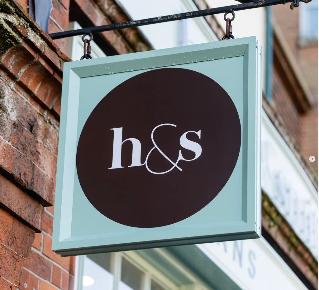 Haine & Smith swing sign designed by Resolution
